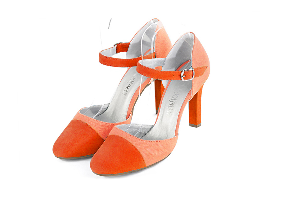 French elegance and refinement for these clementine orange dress open side shoes, with an instep strap, 
                available in many subtle leather and colour combinations. Its high vamp and fitted strap will give you good support.
To personalize or not, according to your inspiration and your needs.  
                Matching clutches for parties, ceremonies and weddings.   
                You can customize these shoes to perfectly match your tastes or needs, and have a unique model.  
                Choice of leathers, colours, knots and heels. 
                Wide range of materials and shades carefully chosen.  
                Rich collection of flat, low, mid and high heels.  
                Small and large shoe sizes - Florence KOOIJMAN